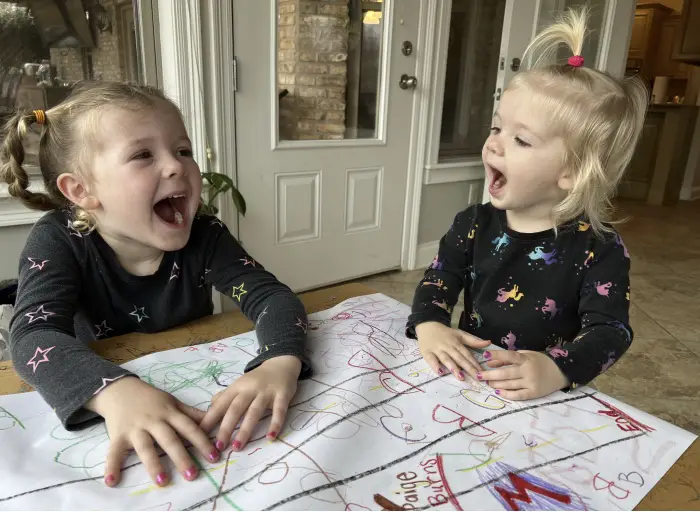 two girls wearing piggy paint nail polish